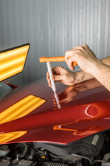 Removing dents on a car body without painting. PDR. - 479153107