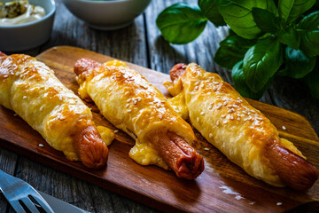 Sausage rolls - pork sausages wrapped on puff pastry 