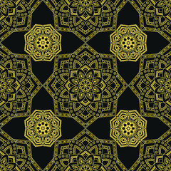 Mandala gold lace on a black background pattern seamless.Vector illustration. 