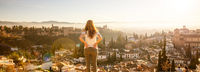 woman enjoying Alhambra view in Andalusia- Europa travel lifestyle