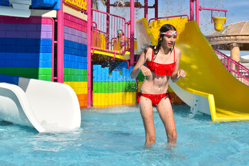 outdoor water park with slides on the territory of the hotel on the sea.