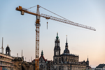 Dresden city skyline at Elbe River under construction at sunset, Dresden, Saxony, Germany
