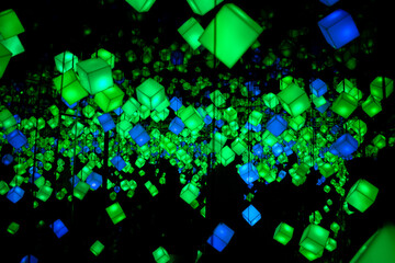 Abstract background in green and blue cube lights
