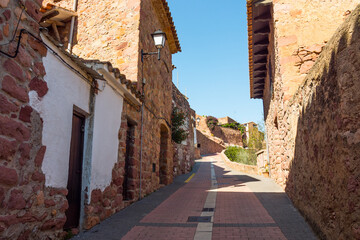 Red Brick Walls Of  Houses From Old medieval streets in Vilafames, Castellon, Spain - medium shot