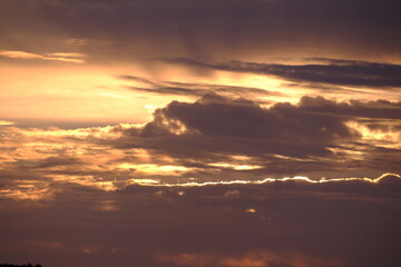 Fototapeta na wymiar sunrise over the clounds