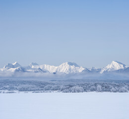 winter mountain valley in snow, seasonal travel background