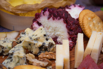 Sliced cheeses and crackers, detail