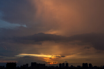 Golden hour orange sunset in the big city silhouette