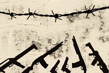wall with cracks, barbed wire, drawing of a weapon, the concept of war, revolution, armed uprising...