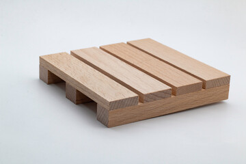 Wooden warehouse pallet. Wooden pallet front and angle view. Cargo loading and transportation..