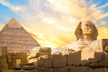 Great Sphinx against the background of the pyramids of the pharaohs Cheops, Khafren, and Mikerin in...