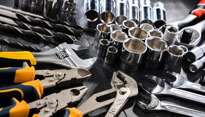 Composition with a variety of metal tools