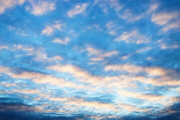 beautiful sunset sky with cirrus and cumulus clouds in late autu