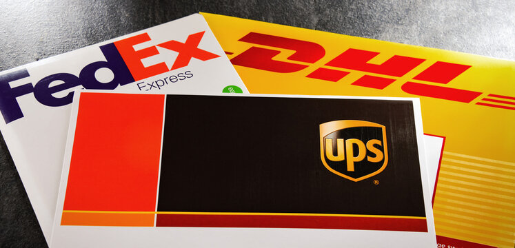 Envelopes of 3 popular courier services: UPS, FedEx and DHL