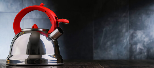 A stainless steel stovetop kettle with whistle
