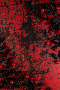 Candy on red weathered surface 
