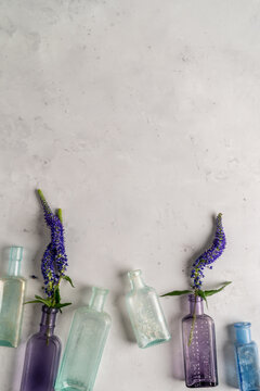 Flowers in clear small bottles 