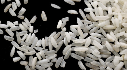 white rice on a black isolated background