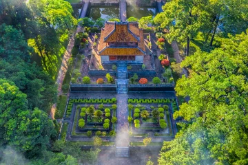 Fotobehang Minh Mang tomb near the Imperial City with the Purple Forbidden City within the Citadel in Hue, Vietnam. Imperial Royal Palace of Nguyen dynasty in Hue. Hue is a popular  © Hien Phung