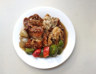 Stir Fried Soft Shell Crab with Black Pepper on white dish.Top view