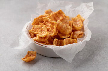 bacon flavored snacks, appetizer, fast food, unhealthy food, on a white background, close-up