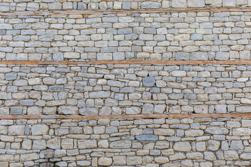 House wall made of processed river stone