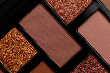 A palette of makeup shadows as an abstract background. MUA and girly concept. Luxury Eyeshadow palette, cosmetics product as luxury beauty brand promotion. Contouring makeup palette close up