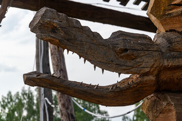 a face carved out of wood