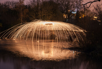 wire wool over river reflection