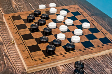 The players got stumped during the game of checkers and now none of them have a move.