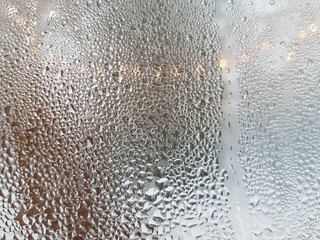 Dew drops on window glass