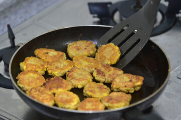 Cooking Korean pan cake called Buchimgae or Jeon