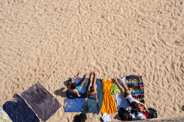 Tourists at Praia de Batata beach in Lagos in the Algarve