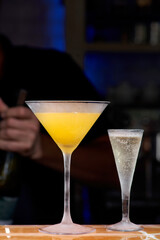 Daiquiri cocktail with rum and lime juice on the bar in a pub or restaurant. Traditional taste.