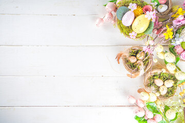 Fototapeta na wymiar Easter eggs and Spring Flowers background