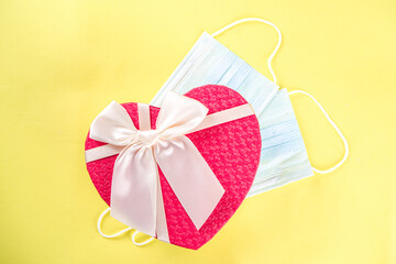 Valentine's gift box with bow and face mask