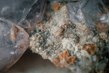 A sample of rock with amethyst under great magnification. Mountain mineral with crystals. Macro, horizontal composition
