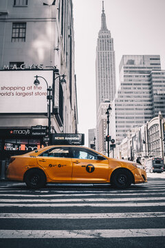 Taxi in New York with the empire state building in the background