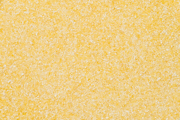 Corn flour background or texture. Close up, top view     