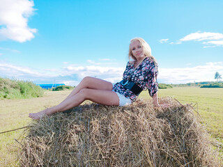 girl on the manger in summer