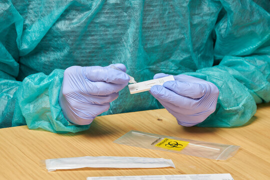 Medic performing a rapid COVID 19 test