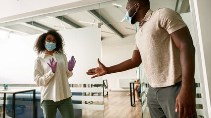 Man giving hand for handshake to dissatisfied girl