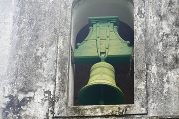 Obraz premium Old bell of the small church Santana Parish (Igreja da Freguesia de Santana), built in the year 1843, Angra dos Reis, Ihla Grande, state of Rio de Janeiro, Brazil