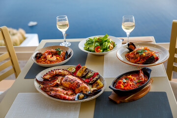 Dinner for two in a restaurant overlooking the sea