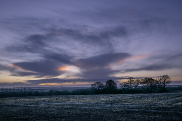 Fototapeta na wymiar Winter sunrise in english fields