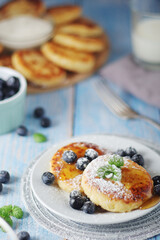 Cottage cheese pancakes - traditional Russian syrniki	