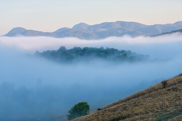 Obraz premium Autumn morning fog landscape