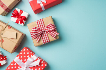 Top view photo of saint valentine's day decorations gifts present boxes on isolated pastel blue background with copyspace