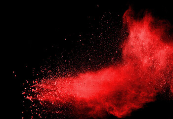 Red powder explosion on white background.