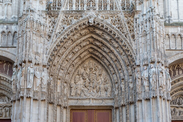 Multitude of elaborate relief sculptures on front of gothic church